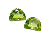 8x6mm half-moon cut Peridot gemstone with vibrant green hues