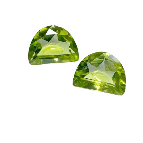 8x6mm half-moon cut Peridot gemstone with vibrant green hues