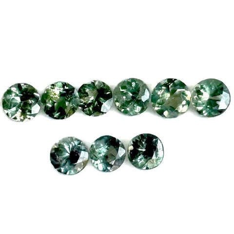 3mm round cut natural Alexandrite gemstone showing colour change hues for fine jewellery design
