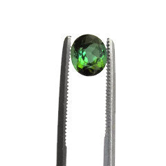 Natural green tourmaline oval cut 6x5mm gemstone.